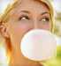 Woman blowing bubble gum